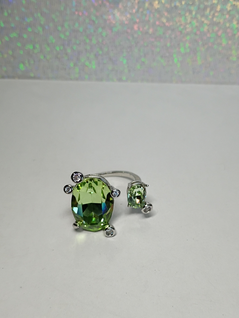 New Faceted Green Peridot Oval Ring with Sparkling Accents-Silver Tone